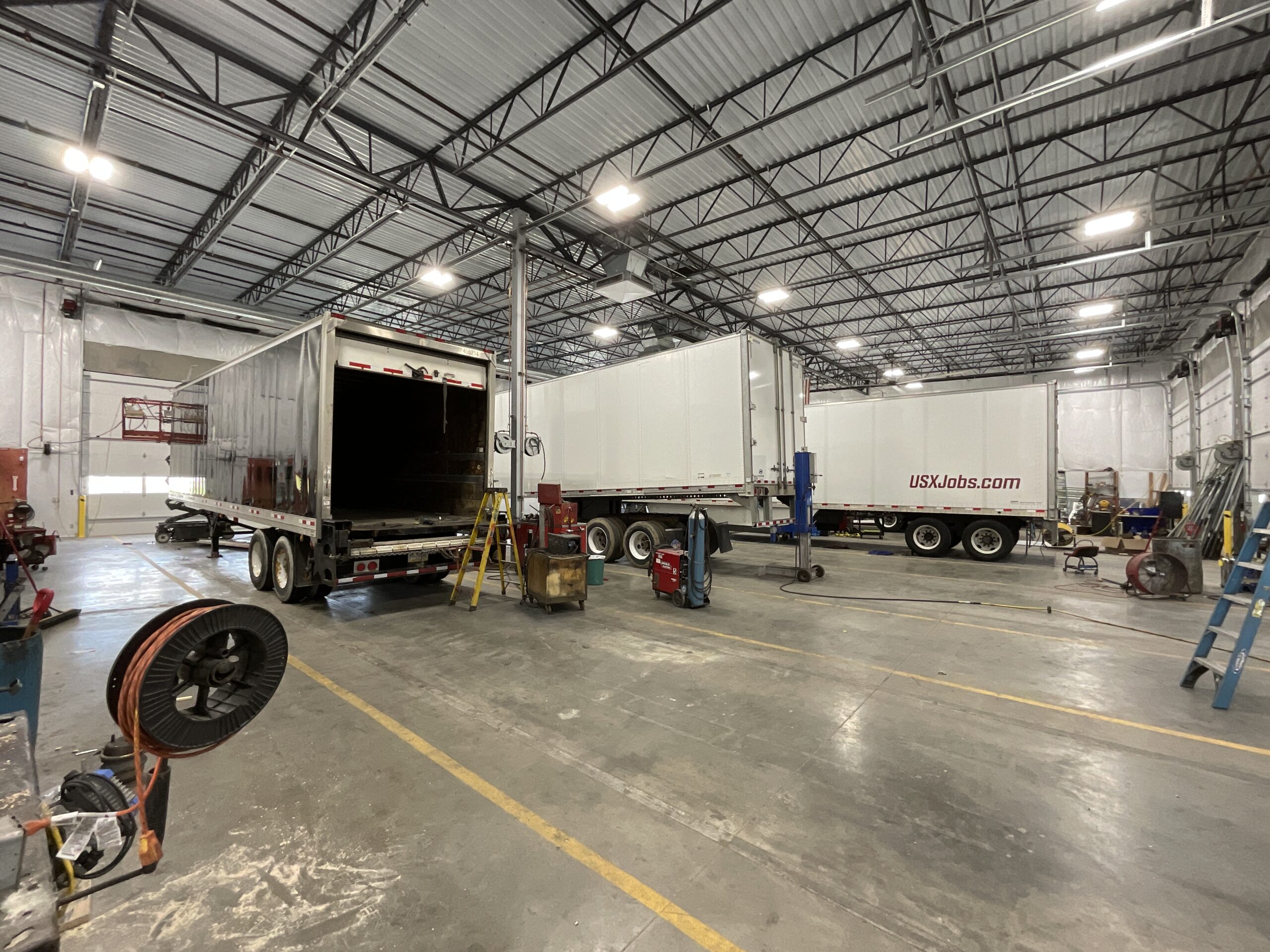 AAA Trailer Repair Shop with trailers being repaired