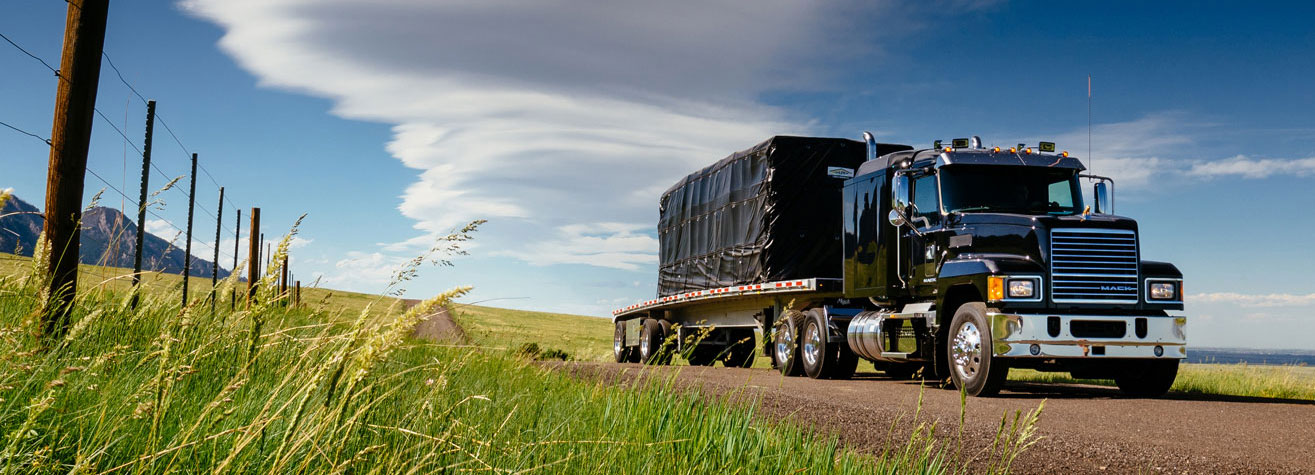 Truck and trailer headed down the road